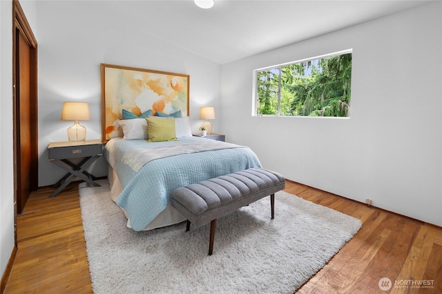 317NW 177th St, Shoreline, WA 98177 - bedroom featuring lofted ceiling and wood finished floors