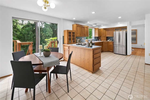 317NW 177th St, Shoreline, WA 98177 - kitchen featuring freestanding refrigerator, white gas stovetop, healthy amount of natural light, light countertops, and recessed lighting