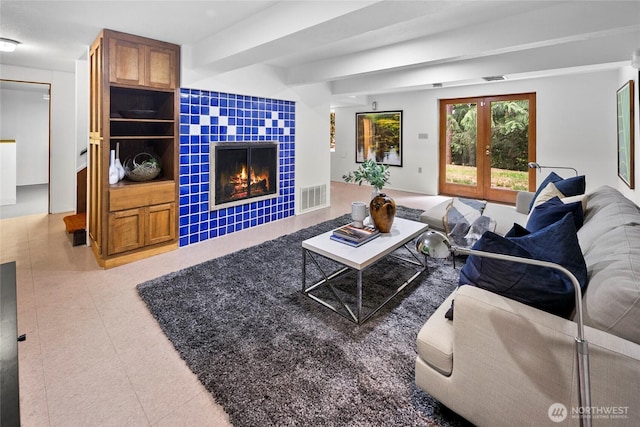 317NW 177th St, Shoreline, WA 98177 - living area with a tiled fireplace and french doors