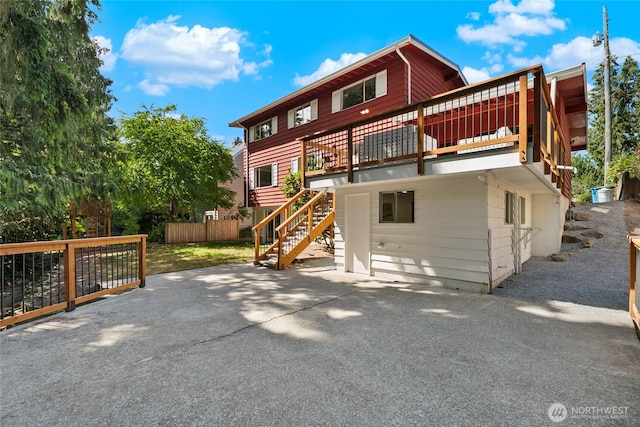 317NW 177th St, Shoreline, WA 98177 - back of house with stairway, a patio area, and a deck