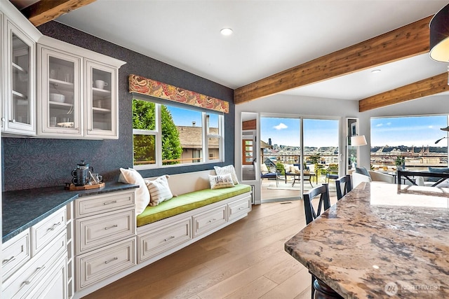 3406 SW Manning St, Seattle, WA 98126 - dining space featuring recessed lighting, plenty of natural light, light wood finished floors, and beamed ceiling