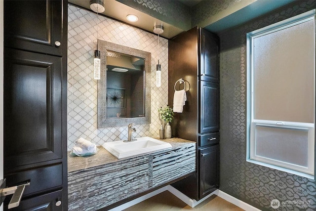 3406 SW Manning St, Seattle, WA 98126 - bathroom featuring vanity and tasteful backsplash