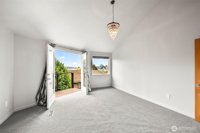 3406 SW Manning St, Seattle, WA 98126 - unfurnished room featuring carpet flooring, a chandelier, and lofted ceiling
