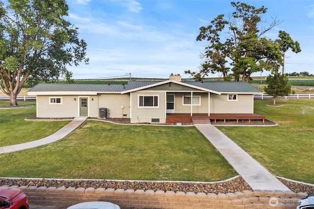 19621 N Glade Rd, Mesa, WA 99343 - rear view of property featuring a lawn and a metal roof