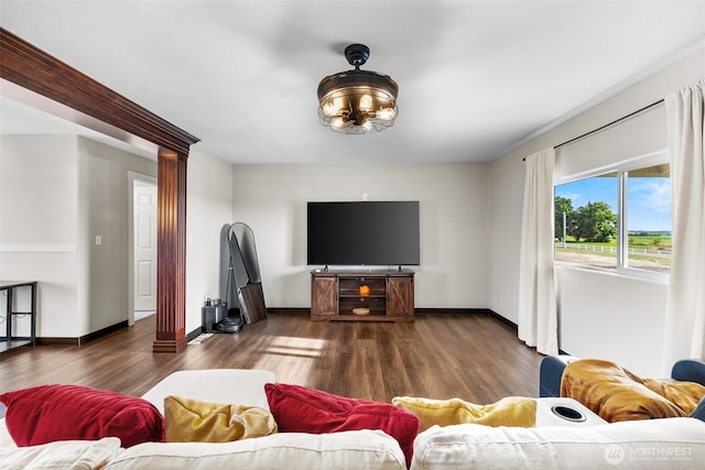 19621 N Glade Rd, Mesa, WA 99343 - living room with wood finished floors and decorative columns