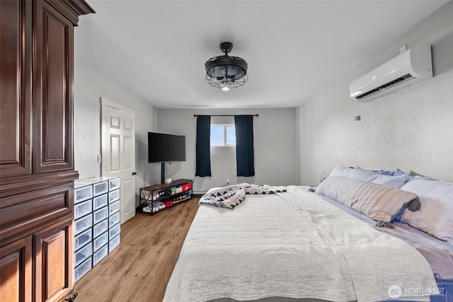 19621 N Glade Rd, Mesa, WA 99343 - bedroom with a wall mounted air conditioner and light wood finished floors