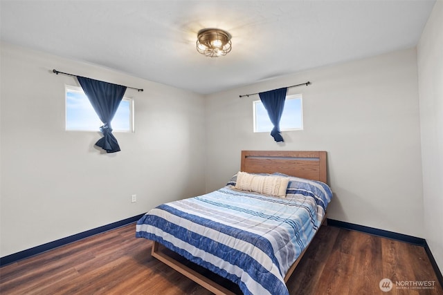 19621 N Glade Rd, Mesa, WA 99343 - bedroom featuring multiple windows and wood finished floors