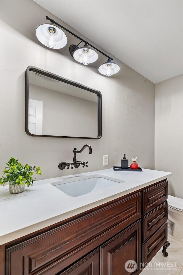 19621 N Glade Rd, Mesa, WA 99343 - bathroom featuring vanity and toilet