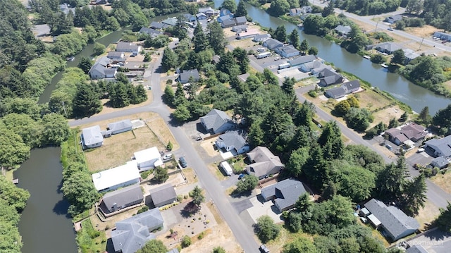 789 Island Cir SE, Ocean Shores, WA 98569 - aerial overview of property's location featuring nearby suburban area and a nearby body of water