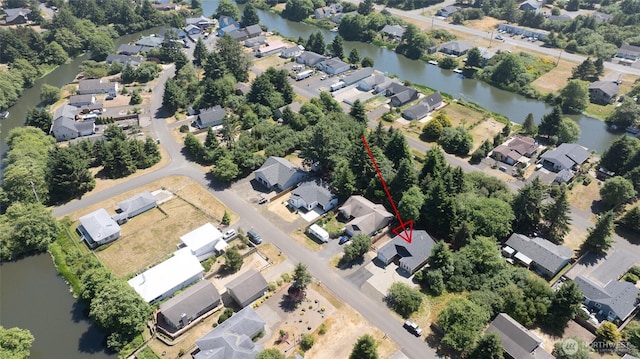 789 Island Cir SE, Ocean Shores, WA 98569 - aerial overview of property's location featuring nearby suburban area and a nearby body of water