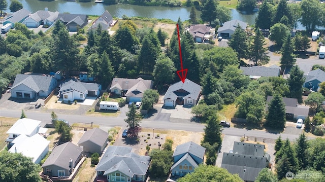 789 Island Cir SE, Ocean Shores, WA 98569 - aerial perspective of suburban area with a nearby body of water