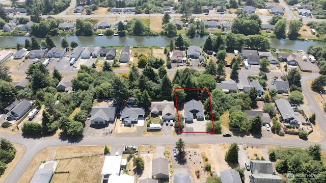 789 Island Cir SE, Ocean Shores, WA 98569 - aerial perspective of suburban area featuring a large body of water and property parcel outlined