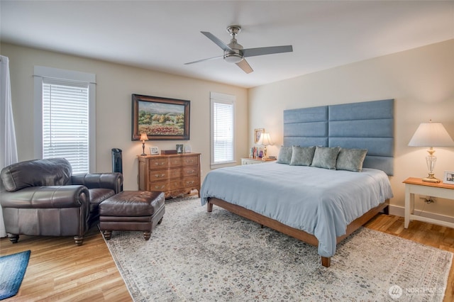 789 Island Cir SE, Ocean Shores, WA 98569 - bedroom featuring light wood-style floors and a ceiling fan