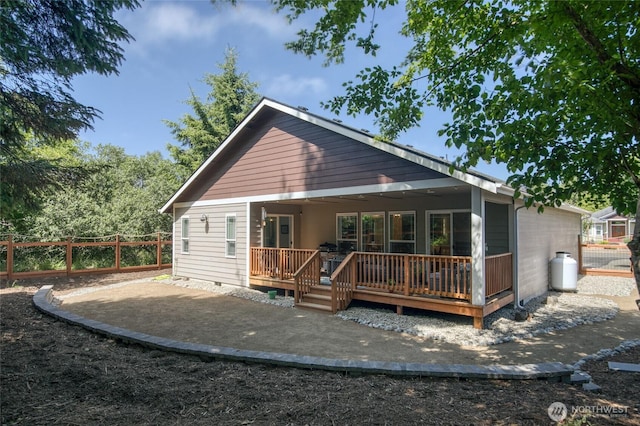 789 Island Cir SE, Ocean Shores, WA 98569 - back of house featuring a deck and a patio