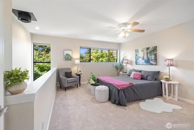 300 N Sequim Ave Unit 15, Sequim, WA 98382 - carpeted bedroom with multiple windows, ceiling fan, and recessed lighting