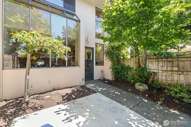 300 N Sequim Ave Unit 15, Sequim, WA 98382 - doorway to property with a patio area and stucco siding