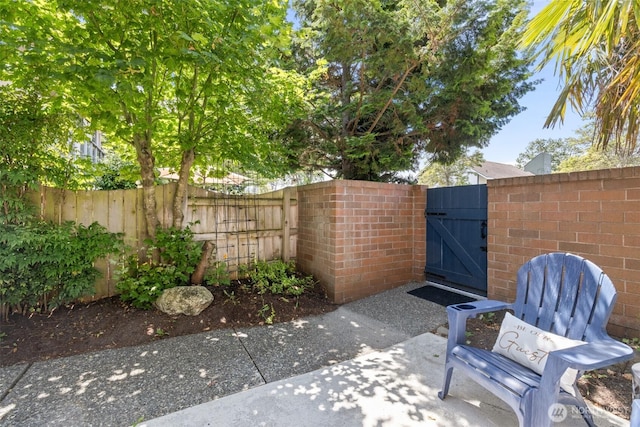 300 N Sequim Ave Unit 15, Sequim, WA 98382 - view of patio featuring a gate