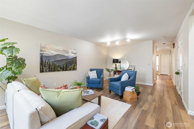 300 N Sequim Ave Unit 15, Sequim, WA 98382 - living area featuring light wood-type flooring and baseboards