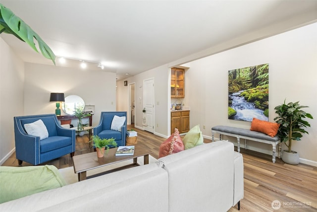 300 N Sequim Ave Unit 15, Sequim, WA 98382 - living room with light wood-type flooring and rail lighting