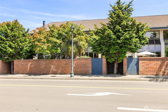 300 N Sequim Ave Unit 15, Sequim, WA 98382 - obstructed view of property with a tiled roof