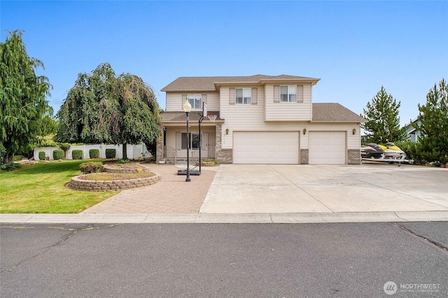 9460 Albert Way SE, Moses Lake, WA 98837 - traditional-style house with brick siding, driveway, a front yard, and a garage