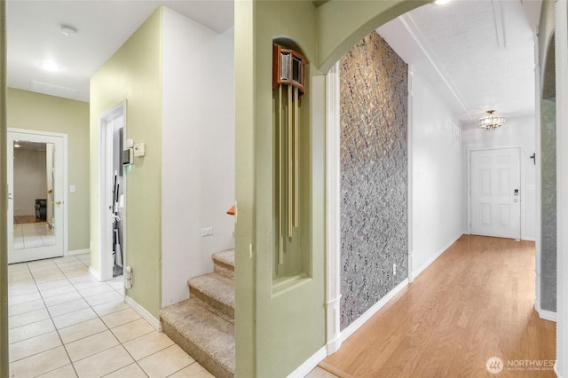 9460 Albert Way SE, Moses Lake, WA 98837 - hallway featuring stairs, arched walkways, and light wood finished floors