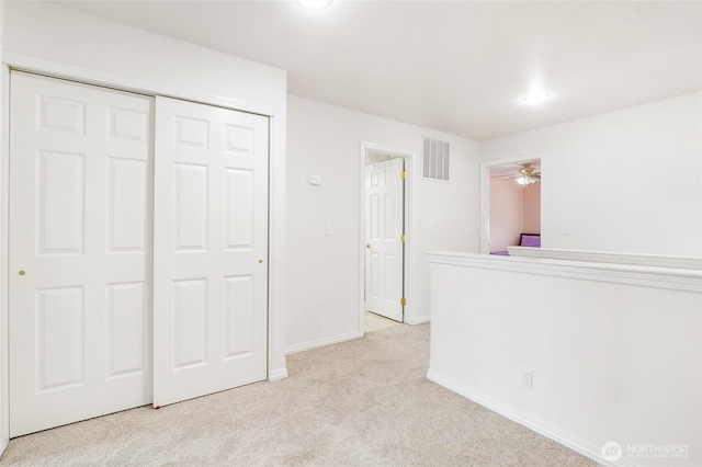 9460 Albert Way SE, Moses Lake, WA 98837 - unfurnished bedroom with light colored carpet and a closet