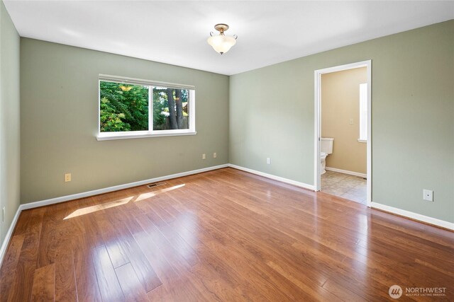 22526 87th Pl W, Edmonds, WA 98026 - unfurnished room with wood finished floors and baseboards