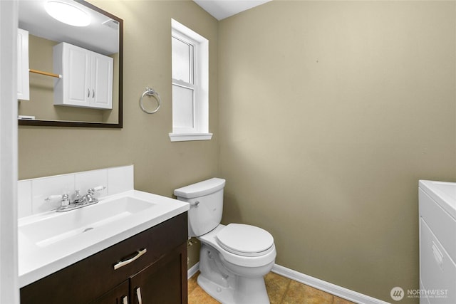 22526 87th Pl W, Edmonds, WA 98026 - bathroom featuring vanity, tile patterned flooring, and washer / clothes dryer