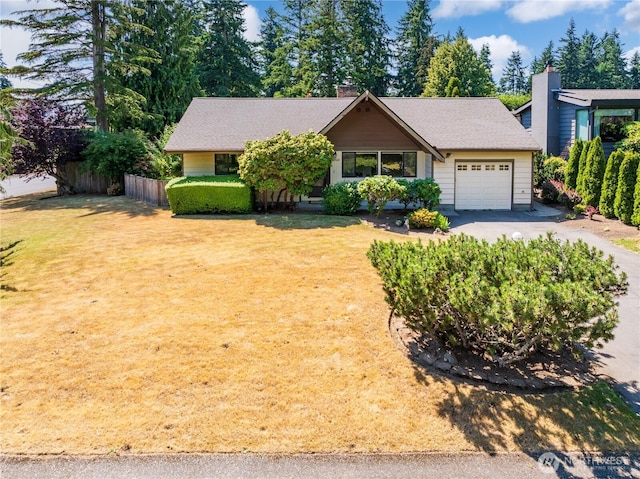 22526 87th Pl W, Edmonds, WA 98026 - view of front of home with an attached garage, driveway, and a chimney