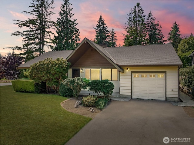 22526 87th Pl W, Edmonds, WA 98026 - view of front of house with an attached garage, driveway, and a front yard
