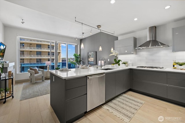 737 Olive Way Unit 1903, Seattle, WA 98101 - kitchen featuring appliances with stainless steel finishes, wall chimney range hood, gray cabinetry, modern cabinets, and recessed lighting