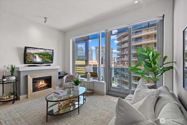 737 Olive Way Unit 1903, Seattle, WA 98101 - living room featuring a fireplace and wood finished floors