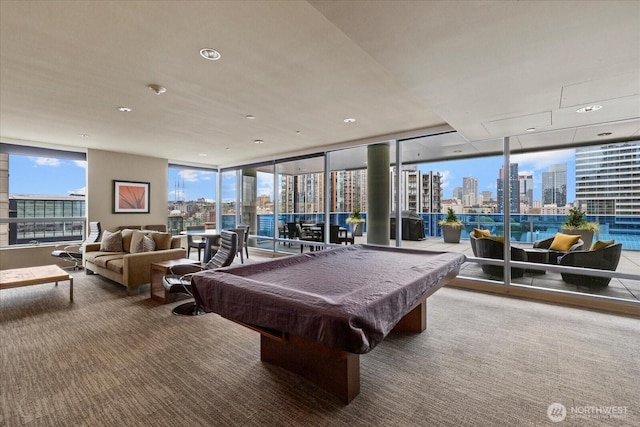 737 Olive Way Unit 1903, Seattle, WA 98101 - recreation room featuring a view of skyline, carpet flooring, and pool table