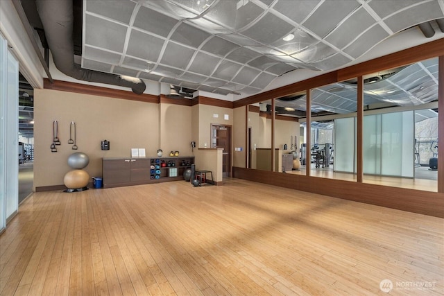 737 Olive Way Unit 1903, Seattle, WA 98101 - workout area with hardwood / wood-style floors and plenty of natural light