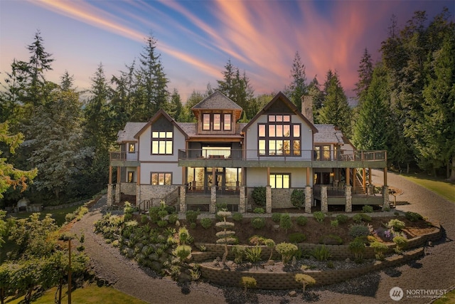 991 Lakeview St, Bellingham, WA 98229 - view of front of home with a balcony, a chimney, stairs, and stone siding