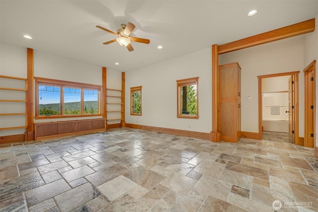 991 Lakeview St, Bellingham, WA 98229 - empty room featuring stone tile floors, recessed lighting, a ceiling fan, and healthy amount of natural light