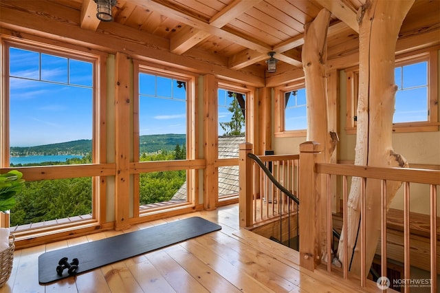 991 Lakeview St, Bellingham, WA 98229 - unfurnished sunroom with a water view, beamed ceiling, and plenty of natural light