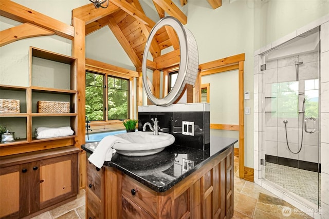 991 Lakeview St, Bellingham, WA 98229 - bathroom with stone tile floors, a shower stall, and vanity