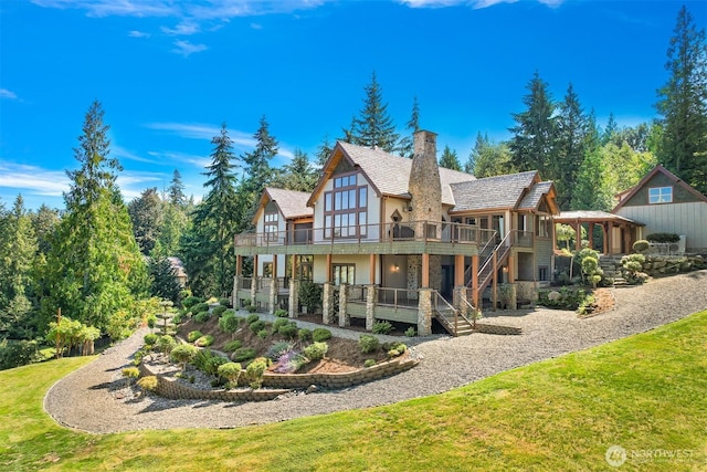 991 Lakeview St, Bellingham, WA 98229 - back of property featuring a deck, stairs, a lawn, and stucco siding