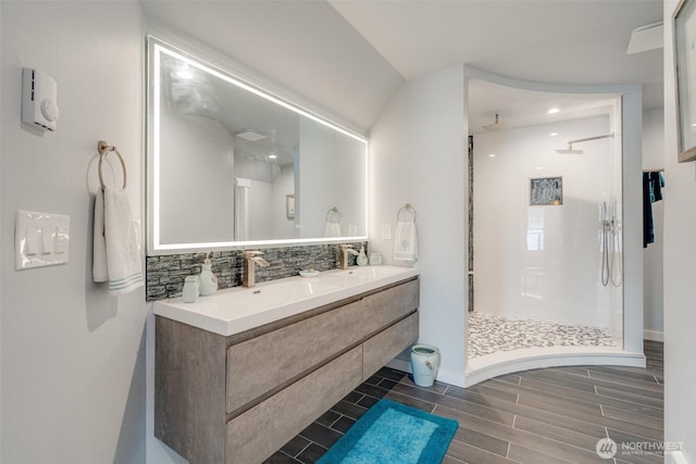 5341 S Bercot Rd, Freeland, WA 98249 - bathroom with a shower stall, tasteful backsplash, double vanity, wood tiled floors, and recessed lighting
