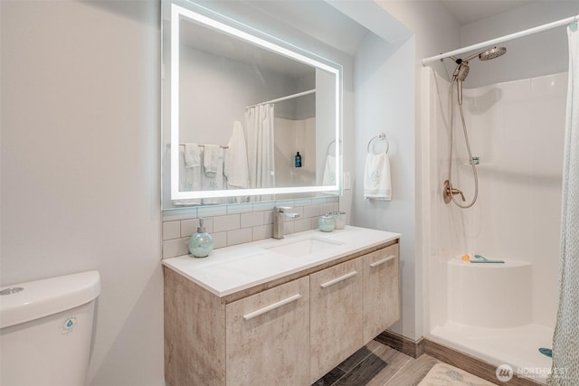 5341 S Bercot Rd, Freeland, WA 98249 - bathroom featuring vanity, a shower with shower curtain, and decorative backsplash