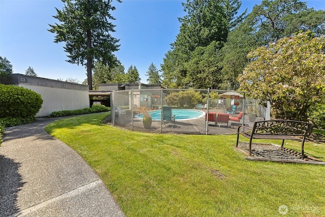 7501 Ruby Dr SW Unit G202, Lakewood, WA 98498 - view of yard with a community pool