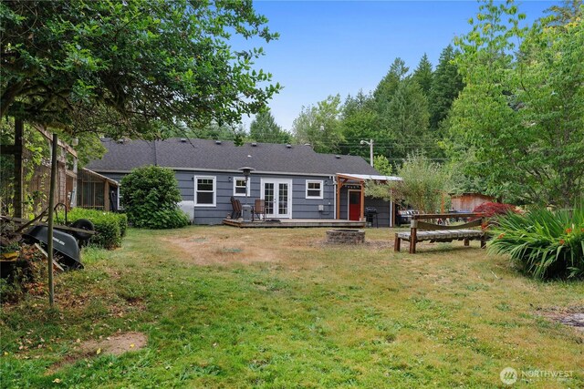 5140 Johnson Point Rd NE, Olympia, WA 98516 - rear view of house featuring french doors and a wooden deck
