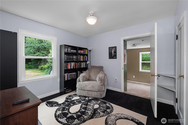 5140 Johnson Point Rd NE, Olympia, WA 98516 - sitting room featuring dark wood-style floors and baseboards