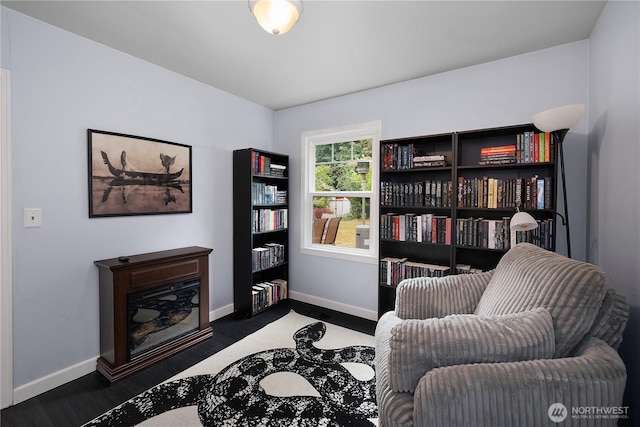 5140 Johnson Point Rd NE, Olympia, WA 98516 - sitting room featuring baseboards and dark wood-type flooring