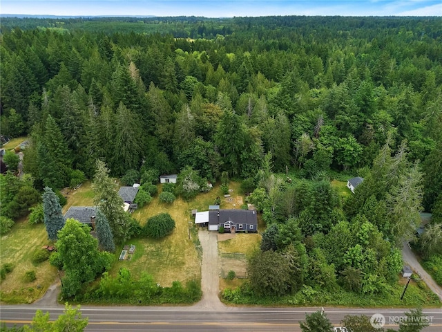 5140 Johnson Point Rd NE, Olympia, WA 98516 - aerial overview of property's location featuring a forest