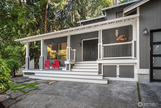 6687 NE Bayview Blvd, Bainbridge Island, WA 98110 - view of exterior entry featuring a porch