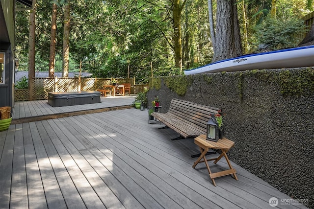 6687 NE Bayview Blvd, Bainbridge Island, WA 98110 - wooden deck with a covered hot tub
