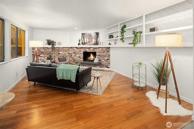 6687 NE Bayview Blvd, Bainbridge Island, WA 98110 - living area with a fireplace and wood finished floors